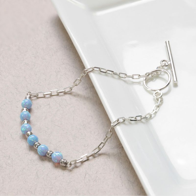 Silver Bracelet with Silver Separator Beads and Blue Opal Beads