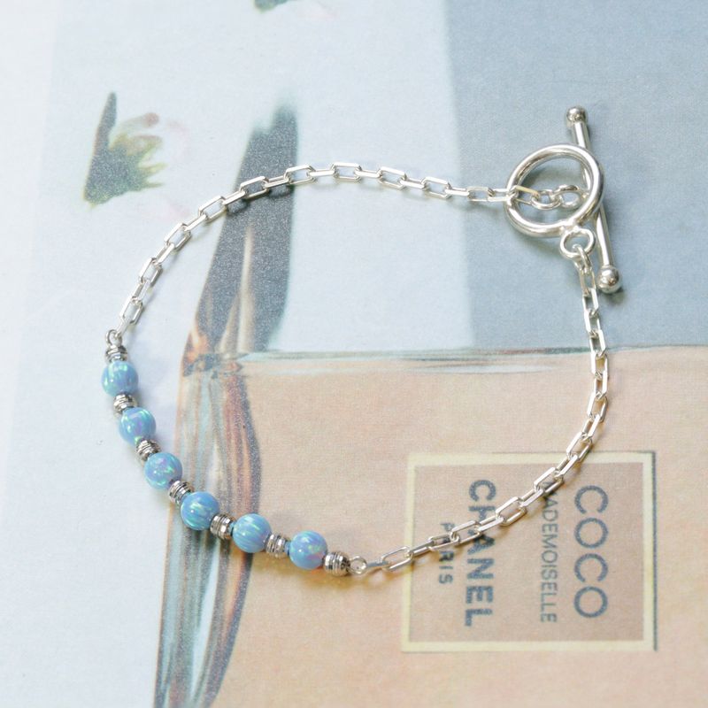 Silver Bracelet with Silver Separator Beads and Blue Opal Beads