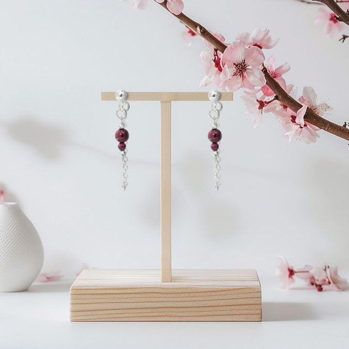 Beaded Earrings with Dangling Chain Connected to a Garnet Butterfly