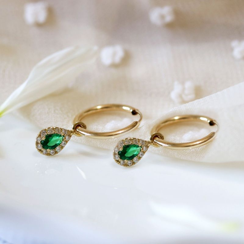 14k Gold Hoop Earrings with Halo Charms and Green Teardrop Zirconia